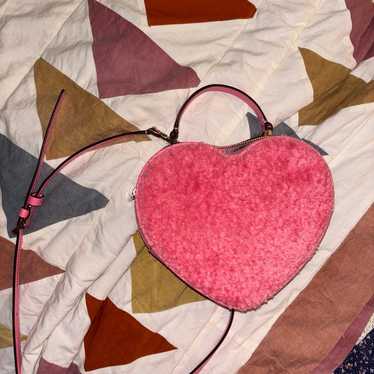 Pink faux fur Kate spade heart purse
