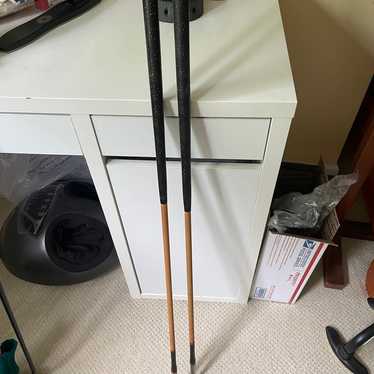 Set of two vintage golf clubs