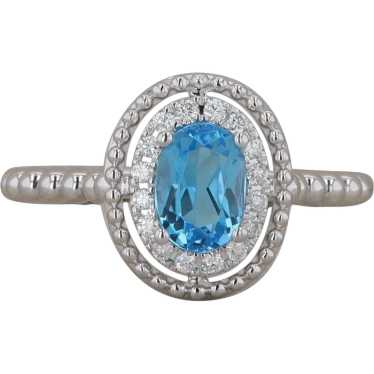 14k White Gold Diamond Halo Oval Blue Topaz Ring