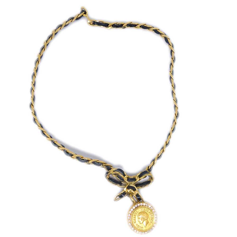 CHANEL Gold Black Bow Medallion Rhinestone Pendan… - image 1