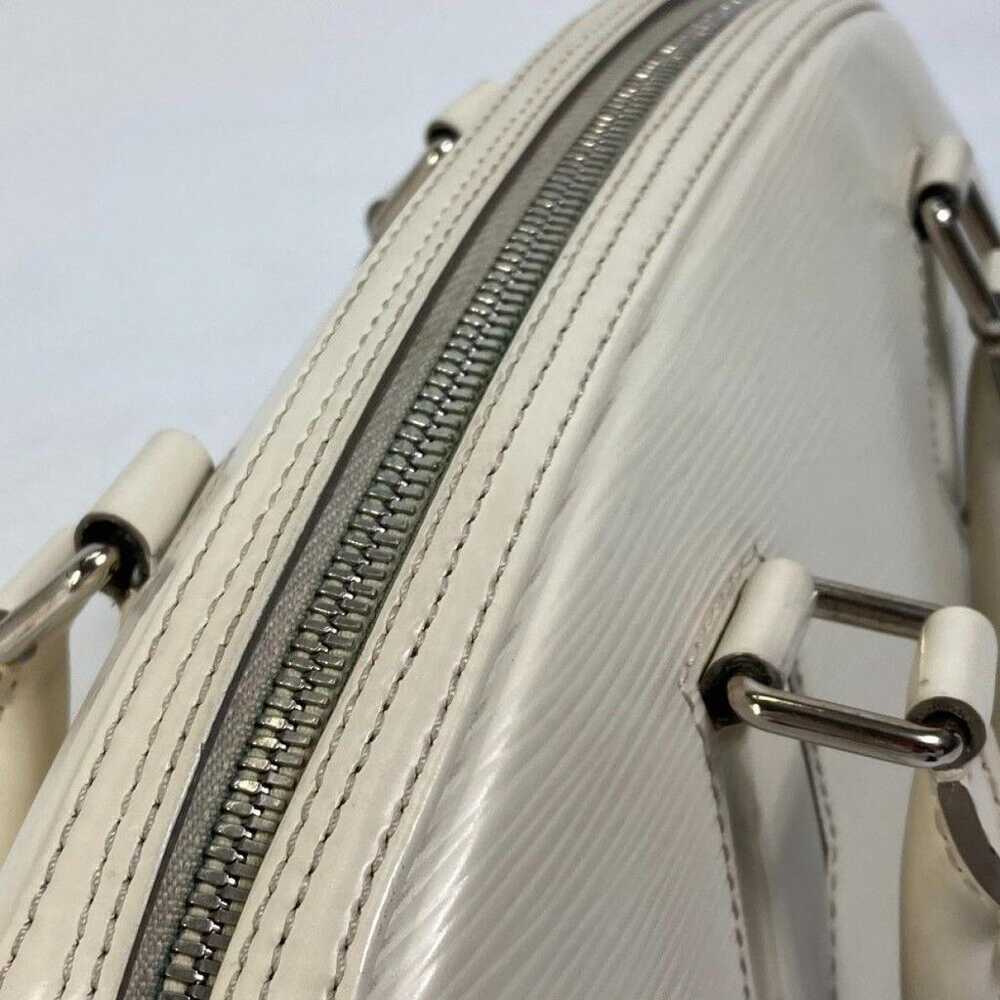 Louis Vuitton Duffle leather handbag - image 12