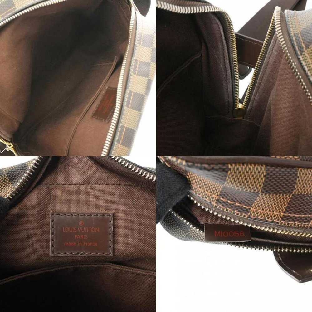 Louis Vuitton Olav cloth handbag - image 12
