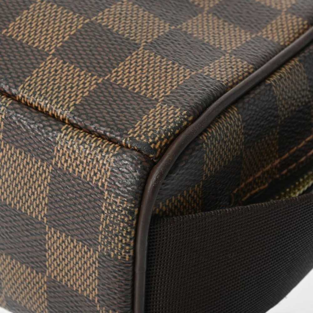 Louis Vuitton Olav cloth handbag - image 8