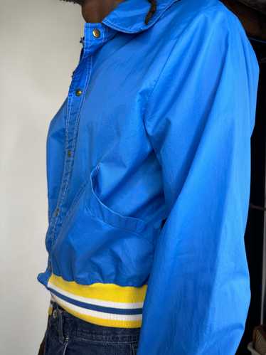 Blue Nylon Windbreaker Snap Jacket with Yellow Ban