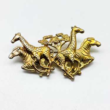AJC Giraffe and Zebra Running Pin Gold Tone Tree … - image 1