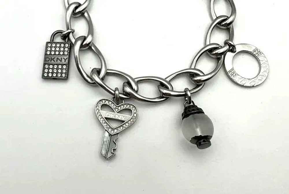 DKNY signed Key to My Heart Silvertone Charm Brac… - image 10