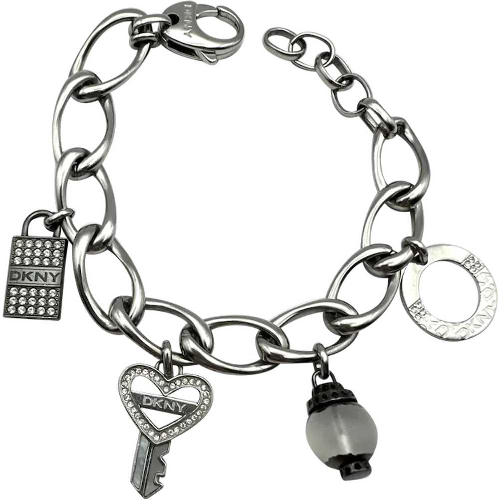 DKNY signed Key to My Heart Silvertone Charm Brac… - image 1