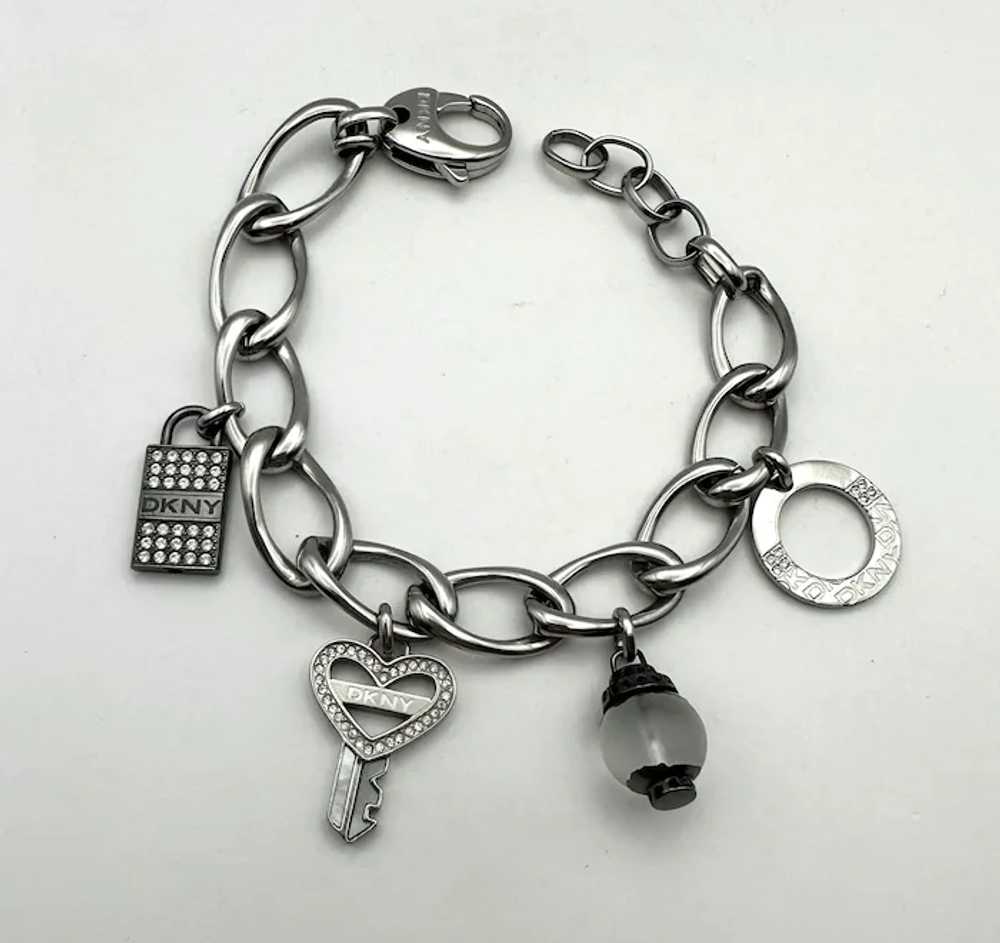 DKNY signed Key to My Heart Silvertone Charm Brac… - image 2