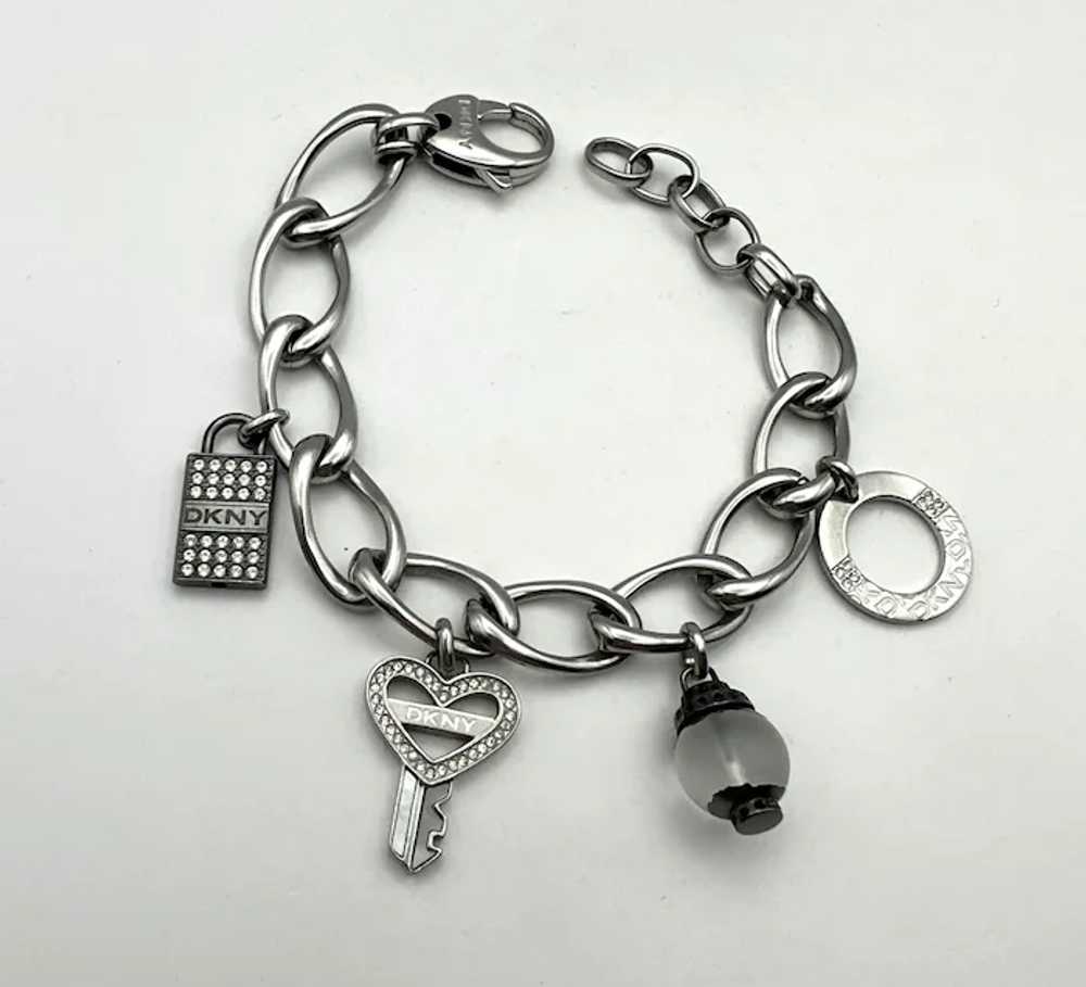 DKNY signed Key to My Heart Silvertone Charm Brac… - image 9