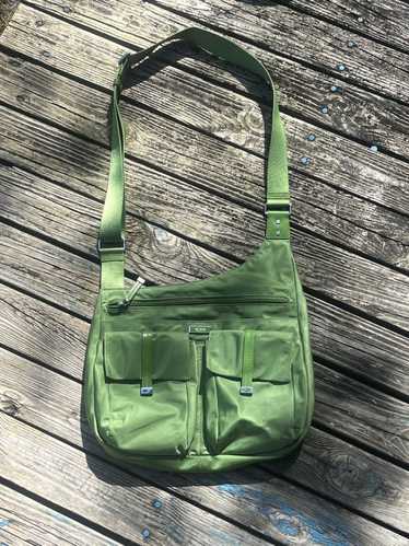 Tumi Pretty gas green tumi bag