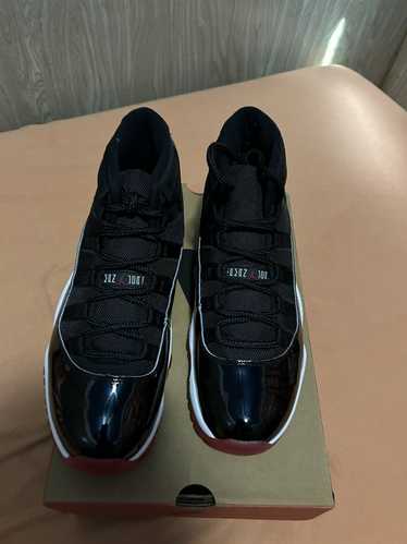 Jordan Brand × Nike Air Jordan 11 Reto Bred