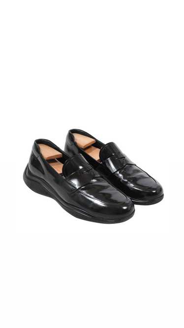 Prada Spazzolato Rois Penny Loafers Black Leather 