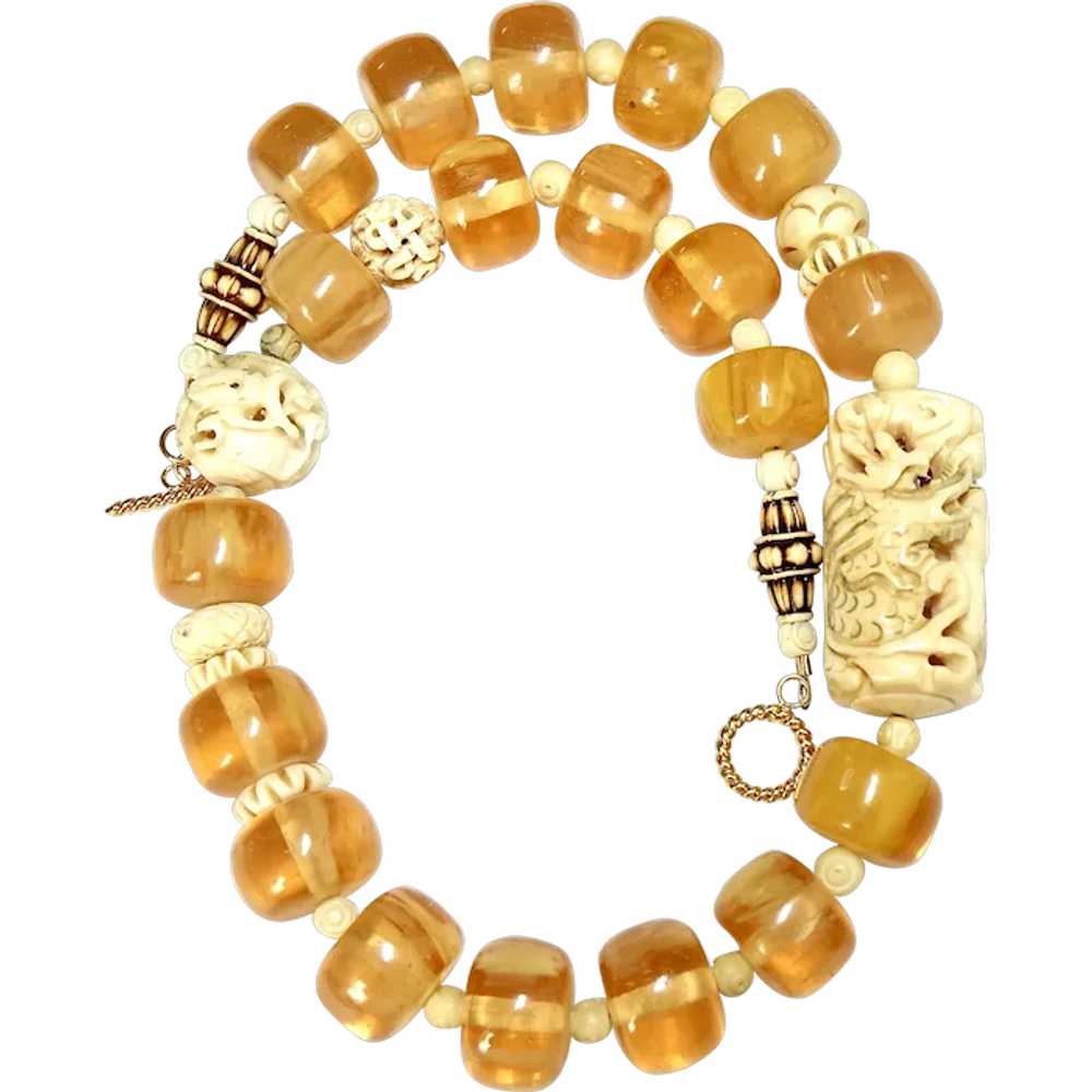 Carved Bone Dragons, Golden Amber Resin Necklace - image 1