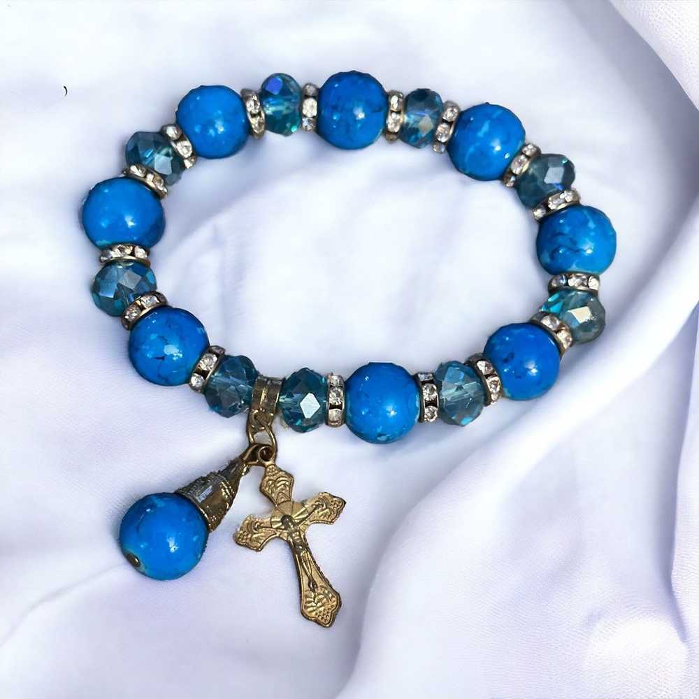 Other Blue beaded stretch bracelet with cross cha… - image 1