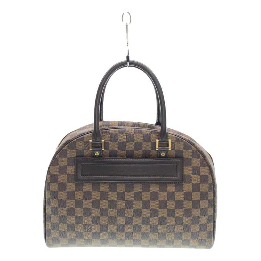 Louis Vuitton Nolita leather handbag - image 1