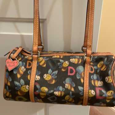 Y2k Dooney and good Bourke barrel bag in orange