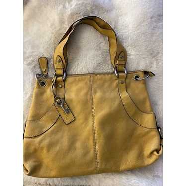 Beautiful Vintage yellow fossil leather handbag.