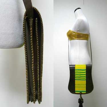 leather . yellow and green woven fabric . structu… - image 1