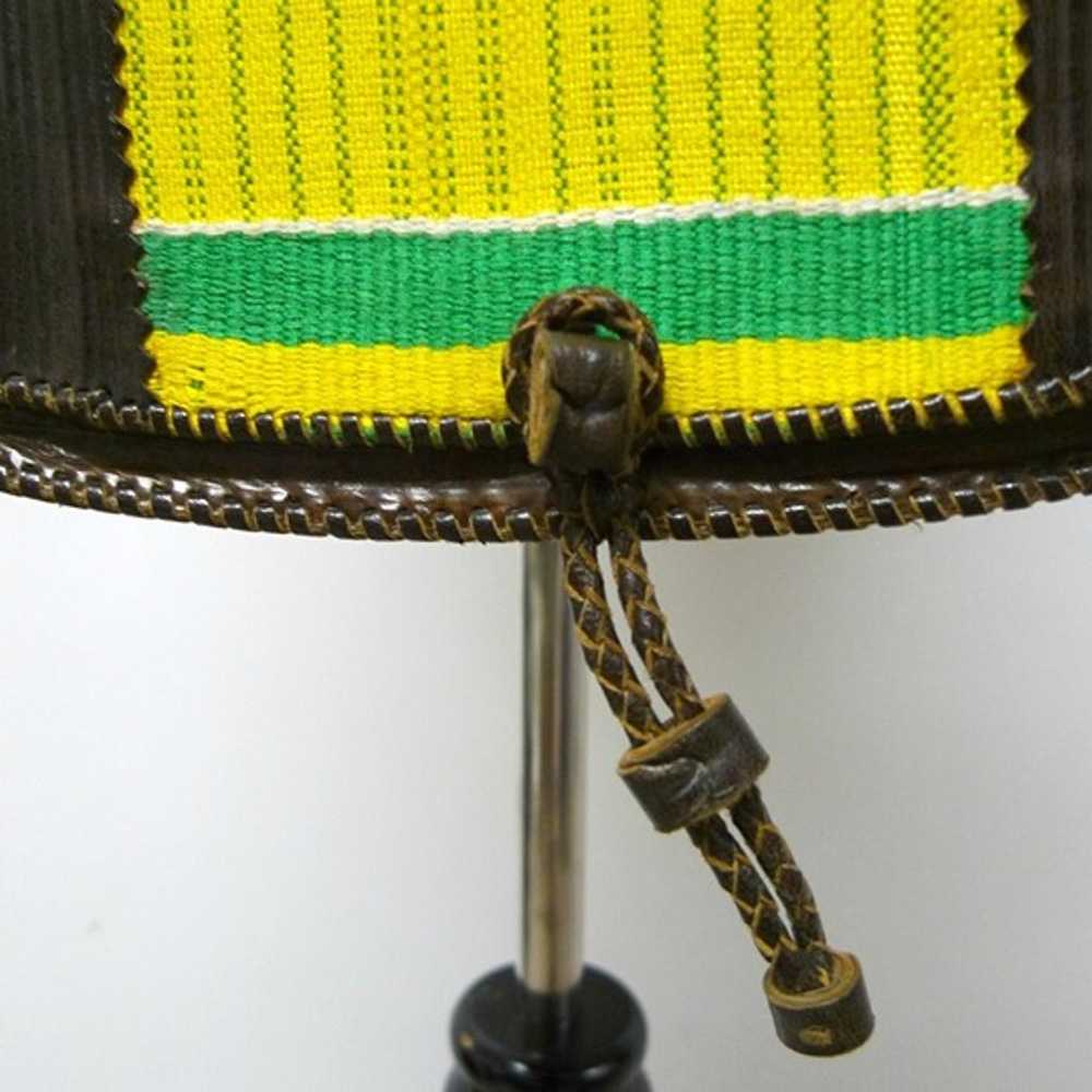 leather . yellow and green woven fabric . structu… - image 3