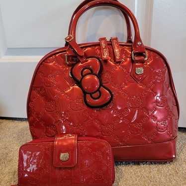 HELLO KITTY LOUNGEFLY selling EMBOSSED SATCHEL(METALLIC RED)