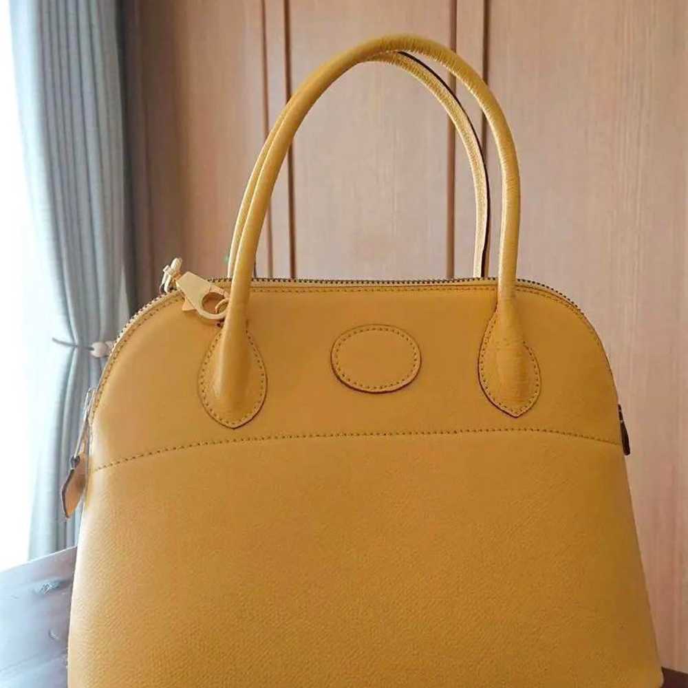 High-class handbag shoulder bag yellow. - image 1