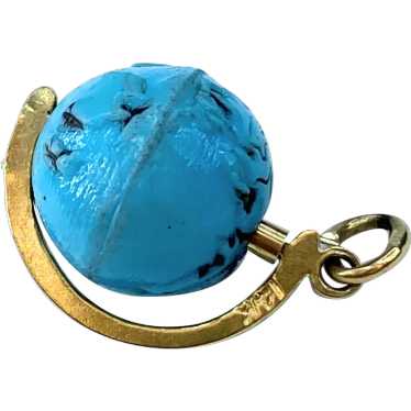 14K yellow gold Blue Global spinning charm