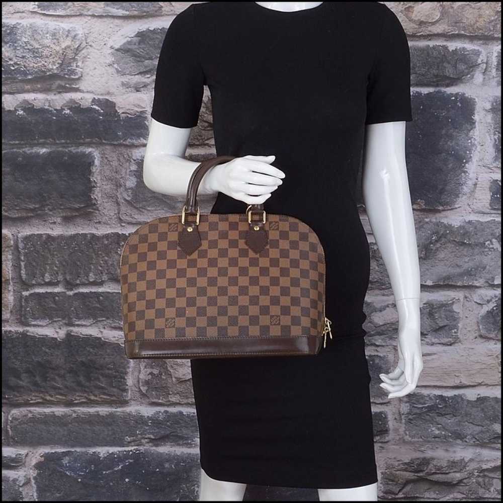 Louis Vuitton Alma cloth handbag - image 6