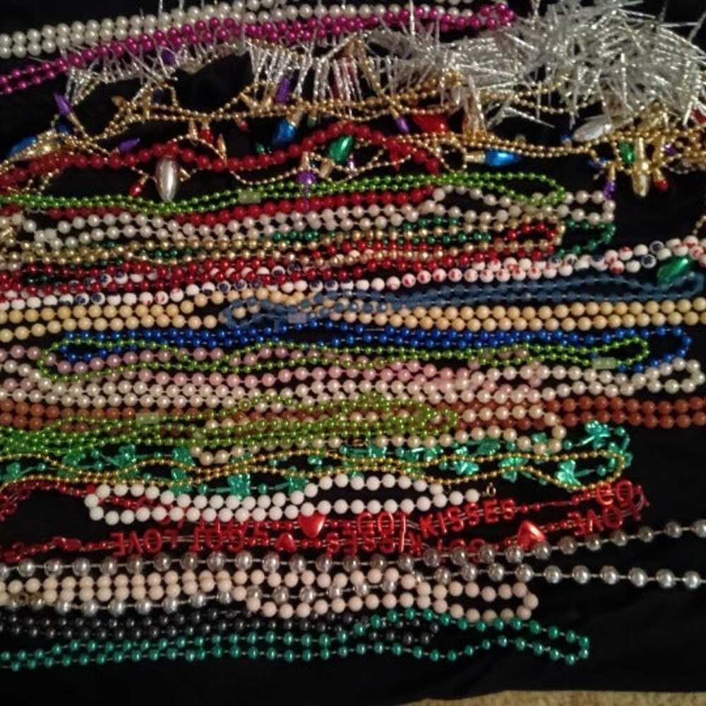 3 LB Marti Gras beads. At least 25 unbroken neckl… - image 1