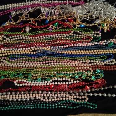 3 LB Marti Gras beads. At least 25 unbroken neckl… - image 1