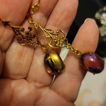 Gold plated dragons breath opal earrings - image 1