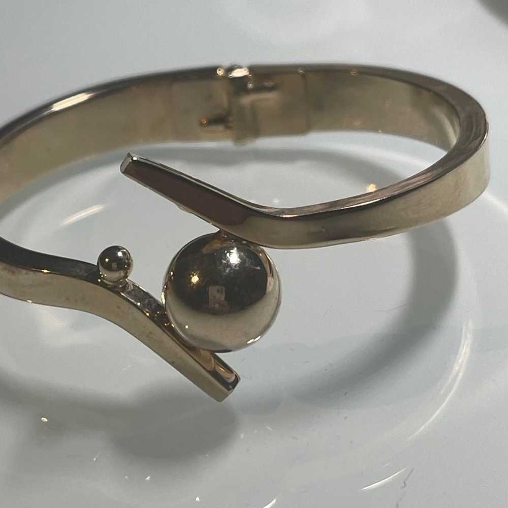 Gold metal hinged bangle Bracelet vintage - image 1