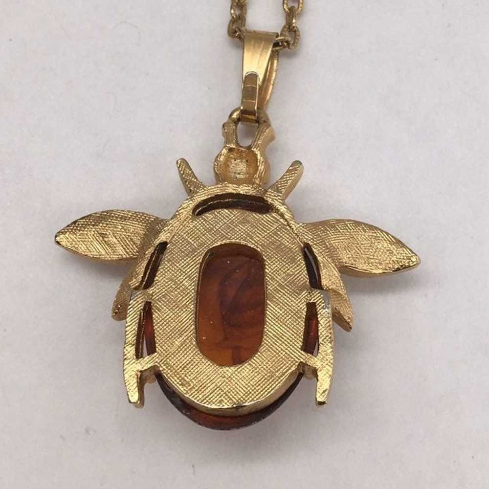 Gold plated amber bug necklace - image 3