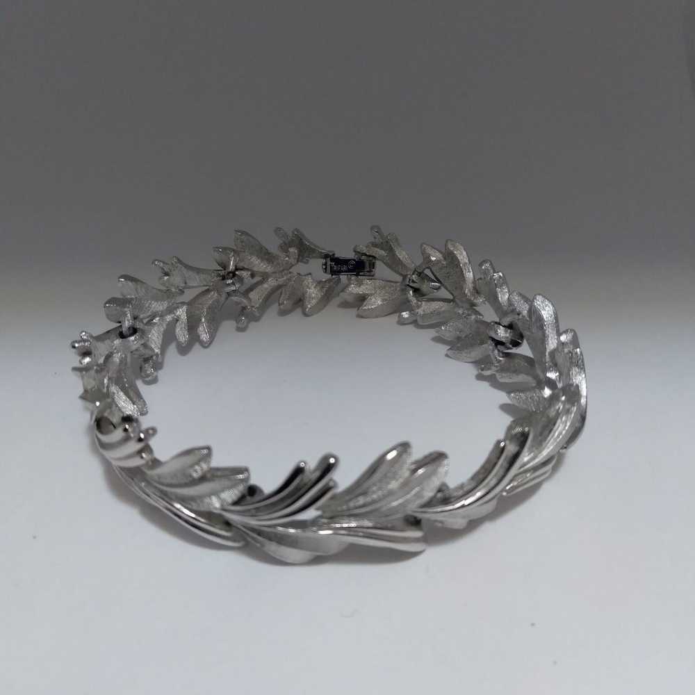 Vintage Crown Trifari silver tone leaf design mot… - image 1