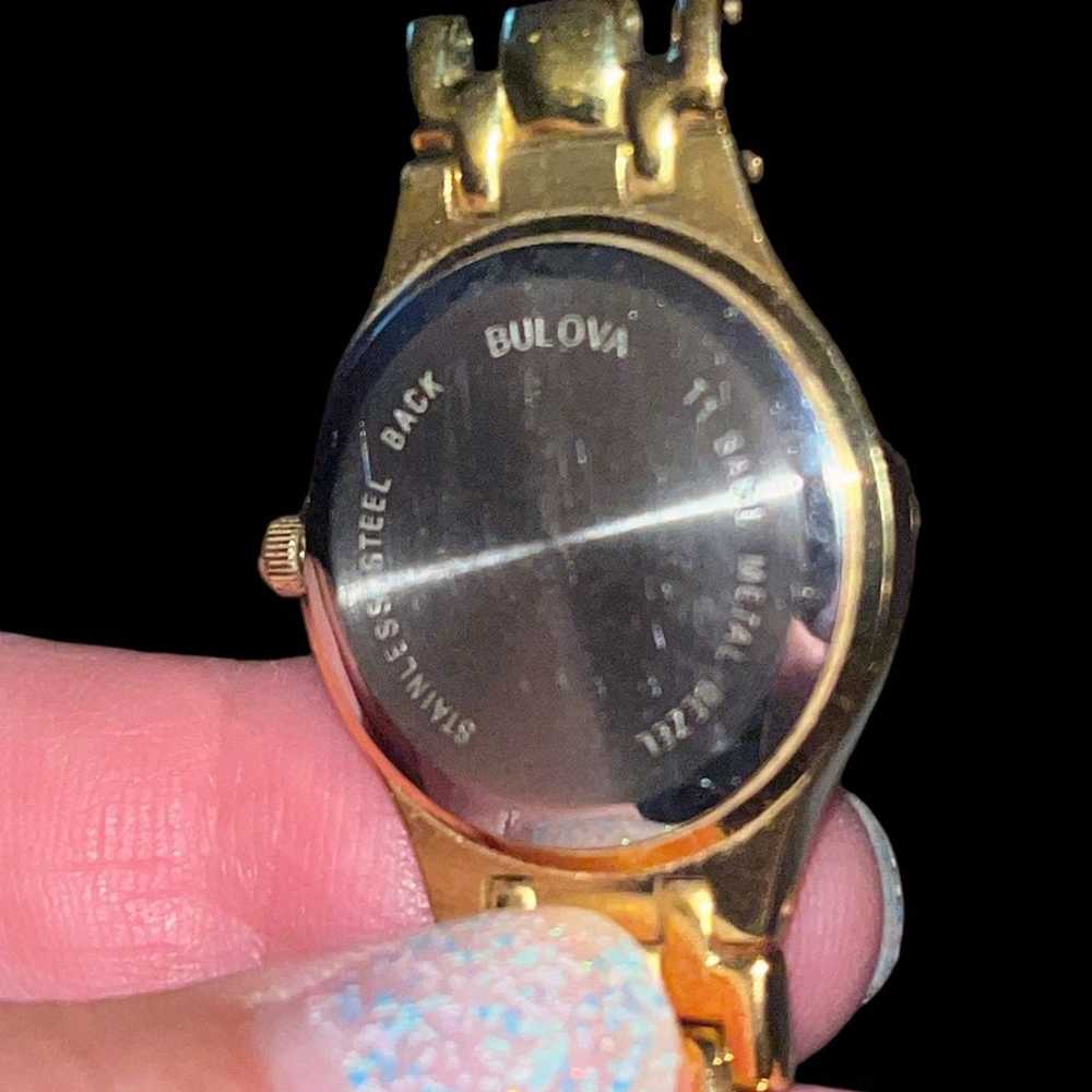 Bulova watch gold with pearl face - image 4