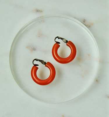 Unique 1950s 1960s Vintage Orange Bakelite Hoop C… - image 1