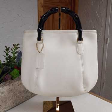 vintage coach old アクセサリーポーチ ハーフムーン 白 vintage coach old アクセサリーポーチ ハーフムーン 白 - メルカリ
