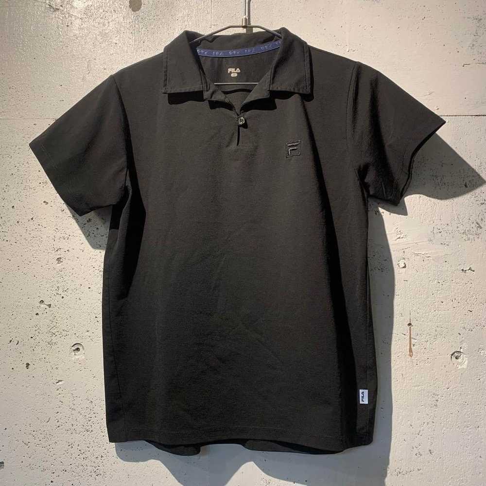 □ 00s FILA women's polo shirt in black made of po… - image 1