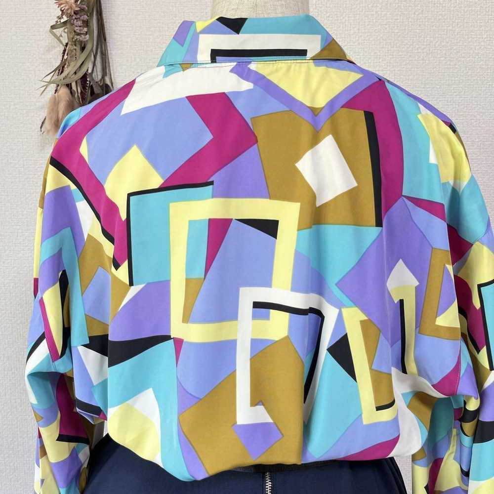 Retro vintage polo shirt with geometric square pa… - image 3