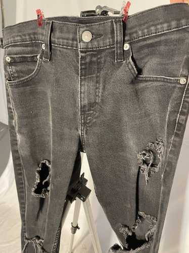 Levi's distressed black jeans