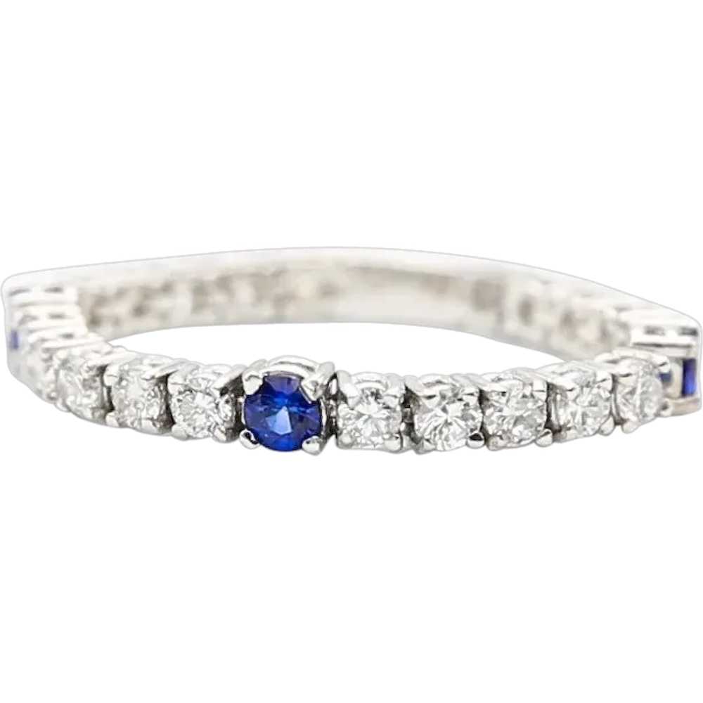 Soft wedding ring in gold, diamonds and sapphires - image 1