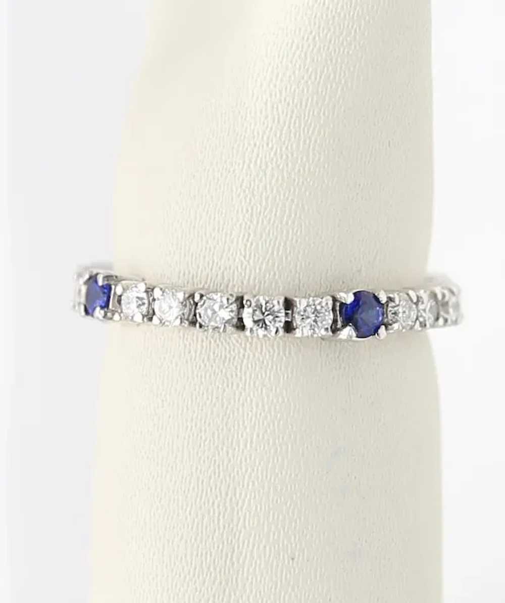 Soft wedding ring in gold, diamonds and sapphires - image 2