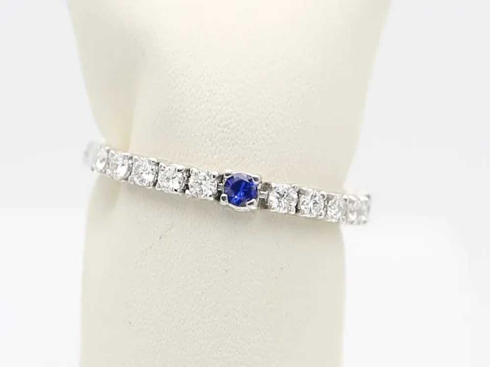 Soft wedding ring in gold, diamonds and sapphires - image 4