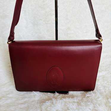 Cartier shoulder bag with vintage burgundy logo