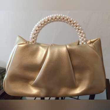 Gold handbag with faux pearl handle - image 1