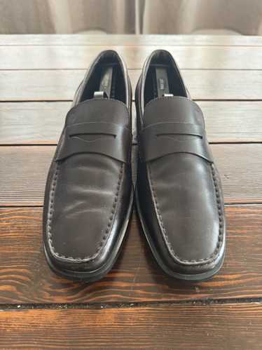 Tod's Tod's dark brown penny loafers