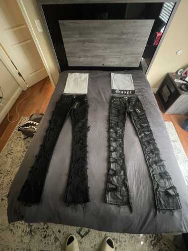 Designer Obsidian black waxed stacked flare denims