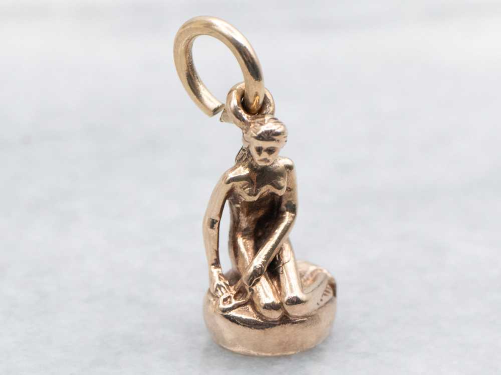 Gold Sitting Figure Charm - image 1