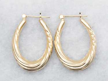 Hollow Oval Twist Hoop Earrings - image 1