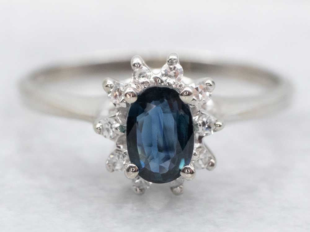 Modern White Gold Sapphire and Diamond Halo Ring - image 1