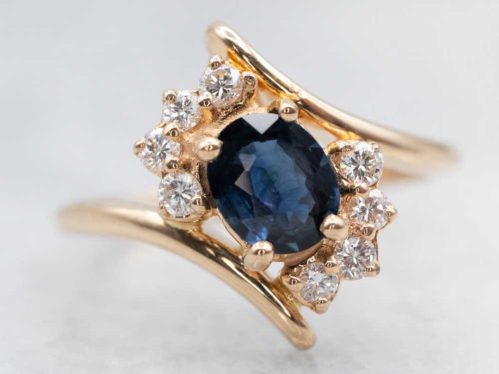 Sleek Yellow Gold Sapphire Bypass Ring with Diamo… - image 1